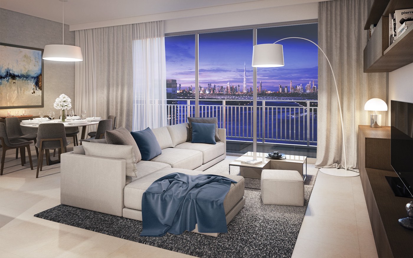 Living room of a Dubai Creek Harbour apartment looking toward the creek and the Dubai skyline